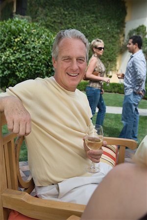 simsearch:693-06015925,k - Man drinking wine in garden Stock Photo - Premium Royalty-Free, Code: 693-06015921