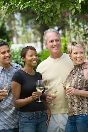 simsearch:693-06015925,k - Two couples drinking wine outdoors Stock Photo - Premium Royalty-Free, Code: 693-06015939