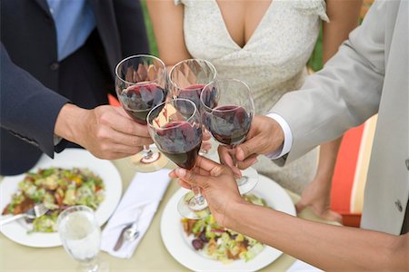 simsearch:693-06015925,k - Friends toasting wine outdoors, close-up Stock Photo - Premium Royalty-Free, Code: 693-06015961
