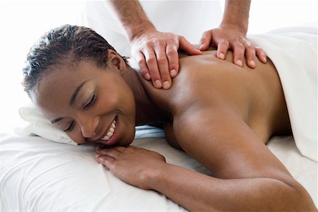 Woman having back massage Stock Photo - Premium Royalty-Free, Code: 693-06016507