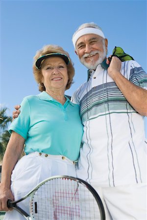 simsearch:693-06015367,k - Senior couple holding tennis equipment, portrait Stock Photo - Premium Royalty-Free, Code: 693-06016604