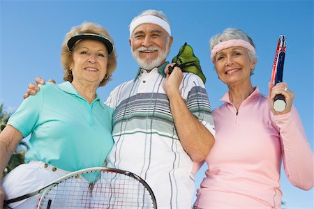 simsearch:693-06015367,k - Three tennis players, portrait Stock Photo - Premium Royalty-Free, Code: 693-06016605