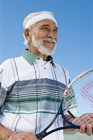 simsearch:693-06015367,k - Senior man holding tennis racket Stock Photo - Premium Royalty-Free, Code: 693-06016613