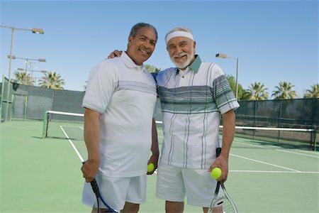 simsearch:693-06015367,k - Two men on tennis court, portrait Stock Photo - Premium Royalty-Free, Code: 693-06016633