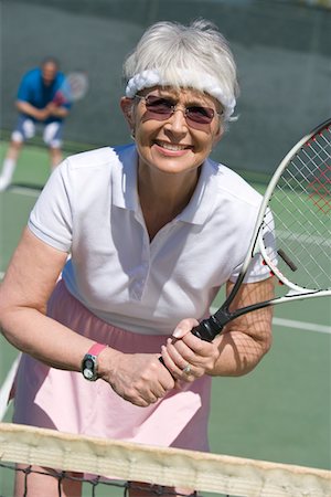 simsearch:693-06015367,k - Senior woman playing tennis, portrait Stock Photo - Premium Royalty-Free, Code: 693-06016641