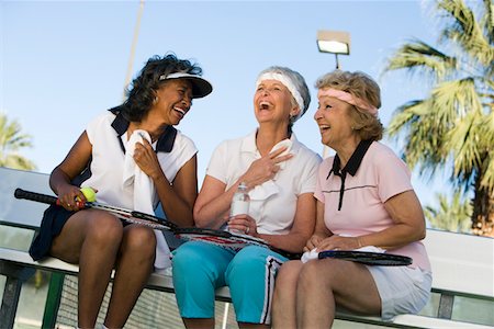 simsearch:693-06016661,k - Three women on tennis court Stock Photo - Premium Royalty-Free, Code: 693-06016667