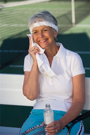 simsearch:693-06016661,k - Female tennis player toweling face Stock Photo - Premium Royalty-Free, Code: 693-06016668