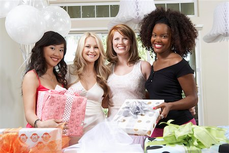 portrait of wedding party - Friends standing Together with gifts at Bridal Shower Stock Photo - Premium Royalty-Free, Code: 693-06017045