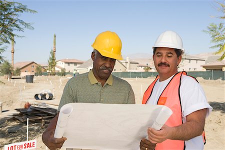 simsearch:693-06016692,k - Surveyor and contraction worker at construction site Stock Photo - Premium Royalty-Free, Code: 693-06017439