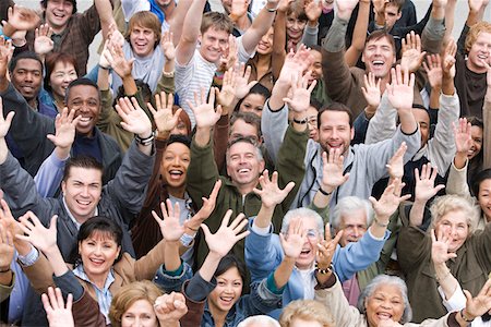 Crowd with arms raised Stock Photo - Premium Royalty-Free, Code: 693-06017567