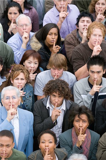 Crowd gesturing silence Photographie de stock - Premium Libres de Droits, Le code de l’image : 693-06017573