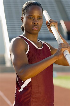 Female athlete preparing for pole jump Foto de stock - Royalty Free Premium, Número: 693-06017870