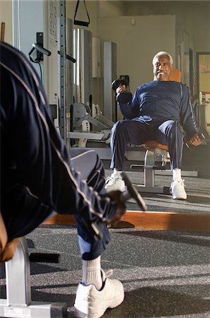 fit older black man in gym - Senior Man Weightlifting Stock Photo - Premium Royalty-Free, Code: 693-06018329