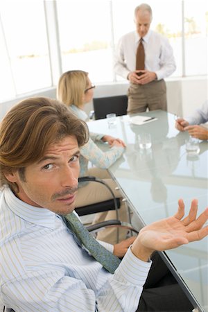 simsearch:693-06019591,k - Business man in conference meeting Stock Photo - Premium Royalty-Free, Code: 693-06018393