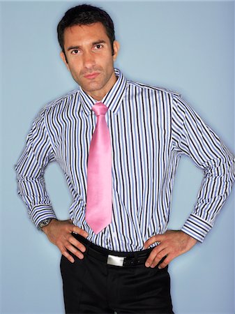 Man in shirt and tie, half length, in studio Stock Photo - Premium Royalty-Free, Code: 693-06018608