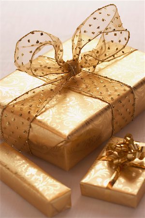 ribbon gold - Wrapped Christmas presents Stock Photo - Premium Royalty-Free, Code: 693-06018772