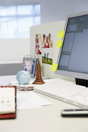 desk toy - Souvenirs on Desk by computer in office Stock Photo - Premium Royalty-Free, Code: 693-06018799
