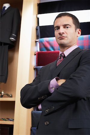 simsearch:693-03707603,k - Businessman in clothes store, portrait Stock Photo - Premium Royalty-Free, Code: 693-06018816