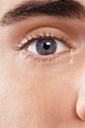 Man's eye, crying Fotografie stock - Premium Royalty-Free, Codice: 693-06018896