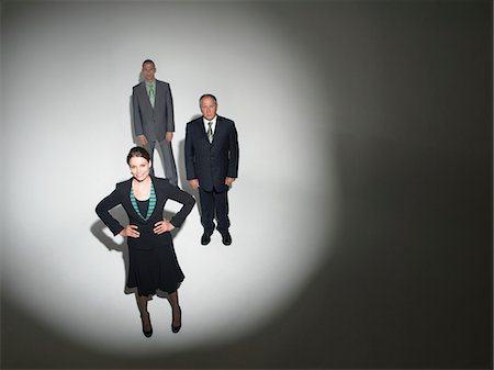 Businesspeople under the spotlight Stock Photo - Premium Royalty-Free, Code: 693-06018997