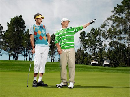 sun visor hat - Two male golfers on green Stock Photo - Premium Royalty-Free, Code: 693-06019128
