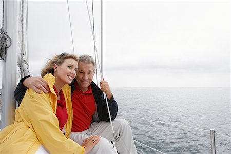 simsearch:693-06019381,k - Couple sur yacht Photographie de stock - Premium Libres de Droits, Code: 693-06019375