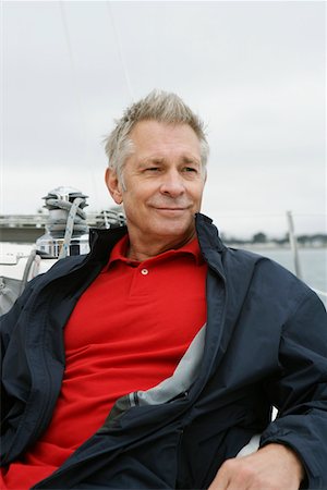 Man relaxing on yacht, portrait Stock Photo - Premium Royalty-Free, Code: 693-06019378