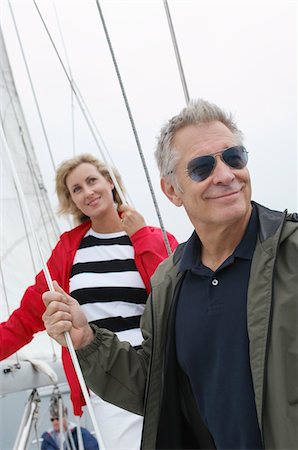 sailboat couple - Couple on yacht Stock Photo - Premium Royalty-Free, Code: 693-06019386