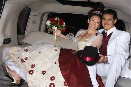 Girl and boy (13-15) in limousine at Quinceanera Stock Photo - Premium Royalty-Free, Code: 693-06019457