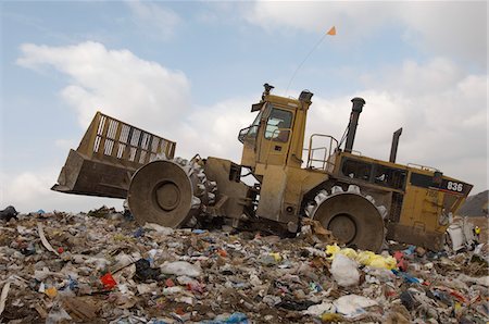 simsearch:694-03327856,k - Digger working at landfill site Stock Photo - Premium Royalty-Free, Code: 693-06019686