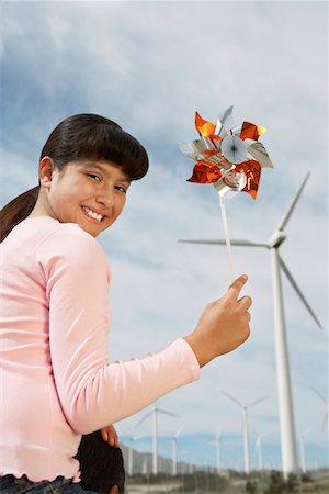 family wind energy - Girl (7-9) holding windmill, sitting on fathers shoulders at wind farm, portrait Stock Photo - Premium Royalty-Free, Code: 693-06019783