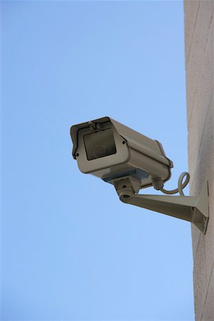 simsearch:693-06022139,k - Security camera on wall Foto de stock - Sin royalties Premium, Código: 693-06019797