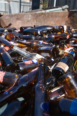 Pile of glass bottles in bin Stock Photo - Premium Royalty-Free, Code: 693-06019878