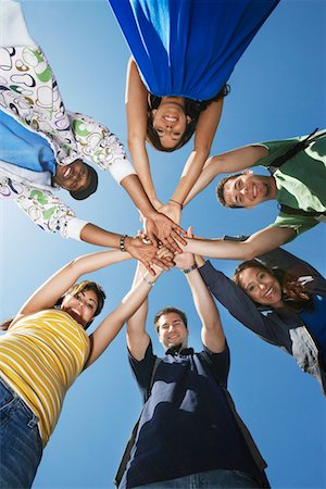 Group of college students in circle, view from below Stock Photo - Premium Royalty-Free, Code: 693-06019915