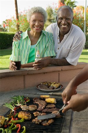 Senior Couple at outdoor barbecue, portrait. Stock Photo - Premium Royalty-Free, Code: 693-06013576