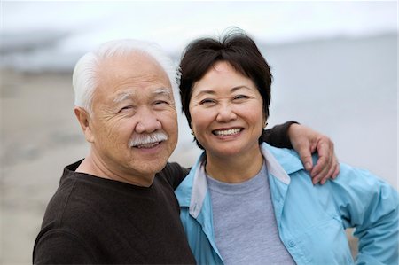 Mature couple smiling, outdoors, (portrait) Stock Photo - Premium Royalty-Free, Code: 693-06013685