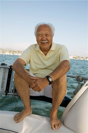 Senior man on sailboat, (portrait) Stock Photo - Premium Royalty-Free, Code: 693-06013680