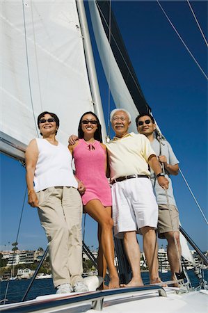 father daughter sailing - Family on sailboat, (portrait) Stock Photo - Premium Royalty-Free, Code: 693-06013683