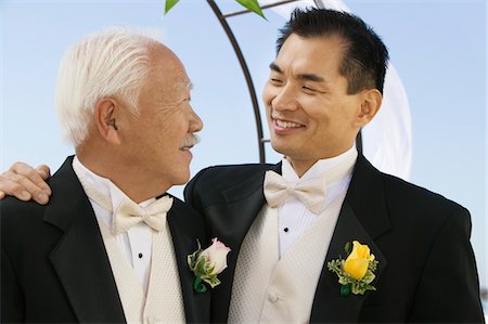 Groom with father, outdoors, (close-up) Stock Photo - Premium Royalty-Free, Code: 693-06013761