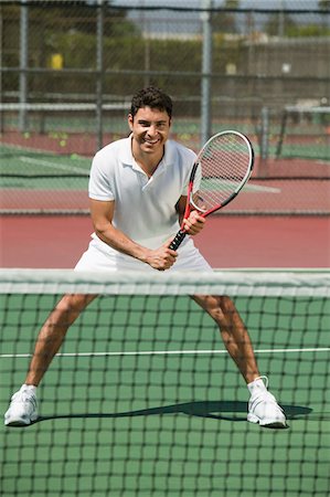 Tennis Player on court Ready to Play, front view Stock Photo - Premium Royalty-Free, Code: 693-06013821