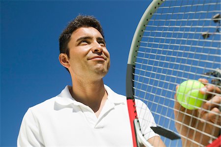 simsearch:693-03565397,k - Male Tennis Player Preparing to Serve, close up, low angle view Stock Photo - Premium Royalty-Free, Code: 693-06013842