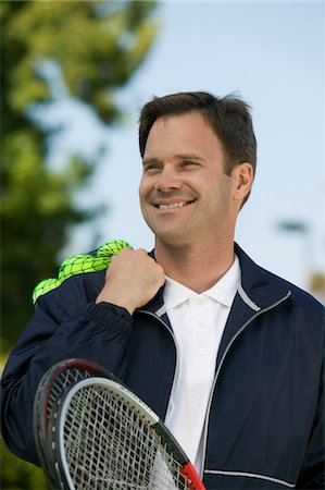 simsearch:693-03565397,k - Man with Tennis Racket and tennis balls Stock Photo - Premium Royalty-Free, Code: 693-06013886