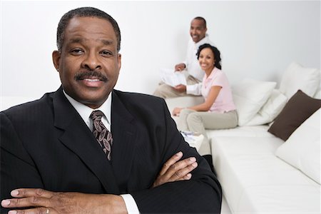 pictures of black male accountants - Accountant with Client Couple Stock Photo - Premium Royalty-Free, Code: 693-06020061