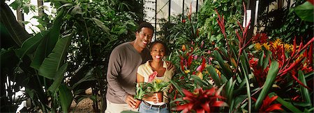 people shopping garden center model release property release - Couple holding plants at garden center, portrait Stock Photo - Premium Royalty-Free, Code: 693-06020113