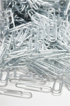 répétition - Heap of paper clips, close-up Foto de stock - Sin royalties Premium, Código: 693-06020294