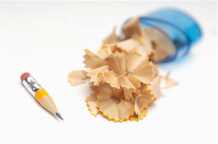 pencil sharpener - Small pencil with shavings Stock Photo - Premium Royalty-Free, Code: 693-06020348