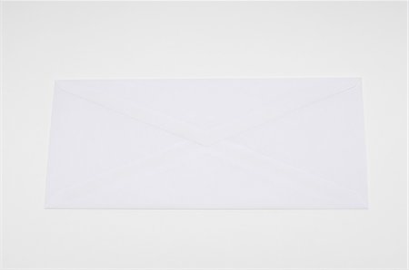 envelope (package) - White envelope on white background Stock Photo - Premium Royalty-Free, Code: 693-06020340