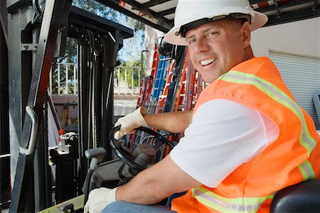 empilhadeira - Forklift Driver Foto de stock - Royalty Free Premium, Número: 693-06020537