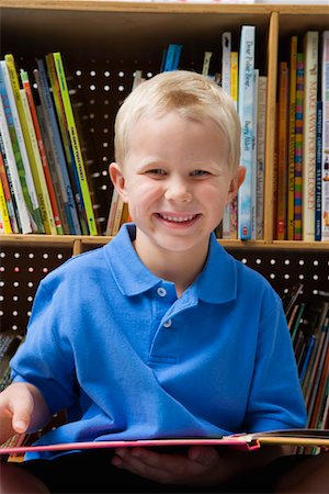 Little Boy Reading a Book Stock Photo - Premium Royalty-Free, Code: 693-06020601