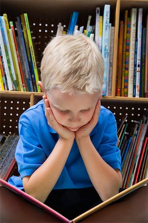 school children outside - Little Boy Reading a Book Stock Photo - Premium Royalty-Free, Code: 693-06020602